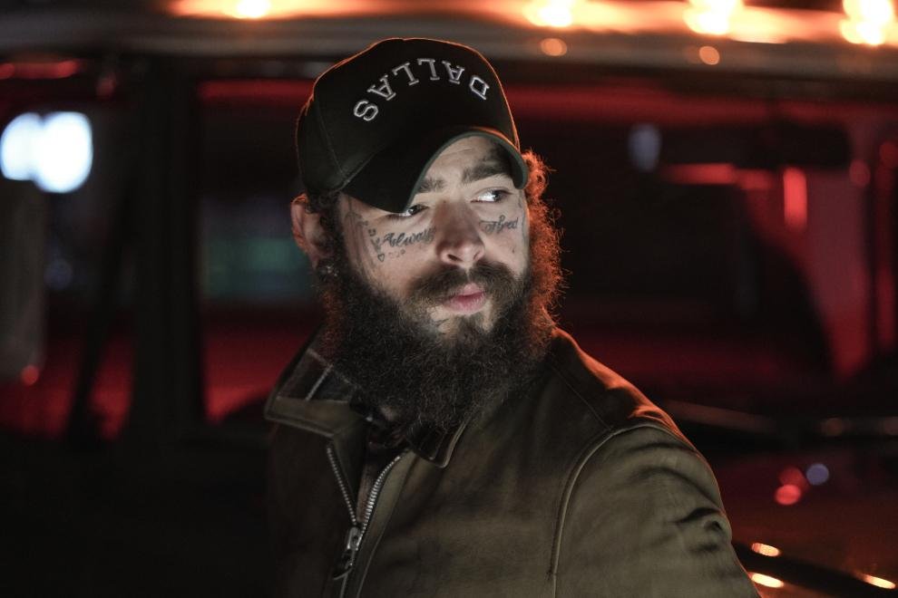 Post Malone poses for picture